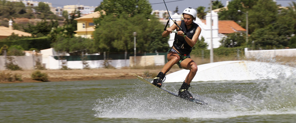 girl-jumping-wakeboarding-algarve-kitesurf-camp